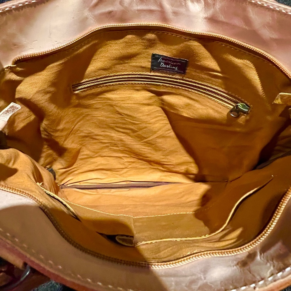 Ladies leather tooled, cow hide hand bag